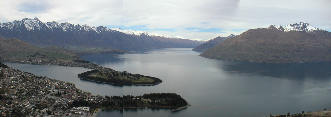 Hilary and I told the hostel receptionist that we wanted to do the longest day hike in the area.  She said "yeah, I guess that would be Ben Lomond."  Ok.  "There might be a bit of snow still, I'm not sure."  Ok, whatever - we started off.  The first leg of the trip was taking a gondola ride (basically like a ski lift) up the side of the first hill.  This is the view of Queenstown and the lake from up at the top of the gondola ride.