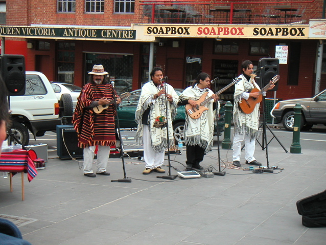 Musicians at the market.  They were so cool that I ended up buying their CD.  I also recorded this background audio.  There was also this awesome little baby standing next to us who was dancing up a storm!  It was one of the cutest, funniest things I have ever seen.