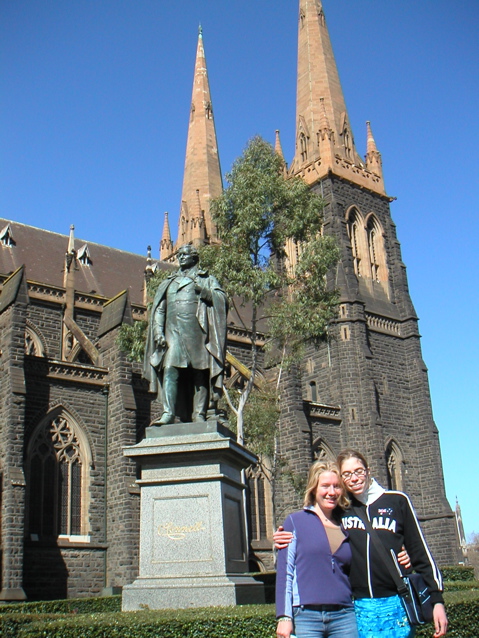 What a picture - the girls, a statue, a eucalyptus tree, *and* a cathedral!