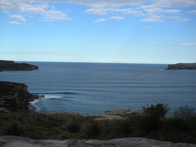 A bigger glimpse of the ocean.  It's just so... flat.  Do you see any rain?  no.