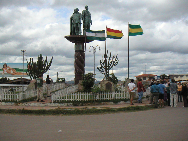 Taking a break next to a statue of "three bad presidents", according to Rubin