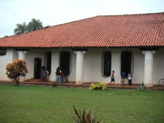 Kids watch the orchestra rehearse from outside the church