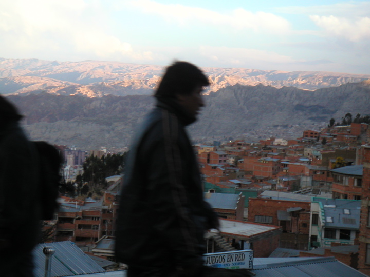 Amazing artsy photo of dude with La Paz and mountains in background