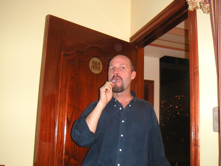 Brad caught brushing his teeth (who took this picture??)