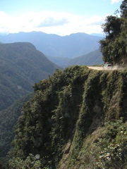 A van screams along the cliff edge