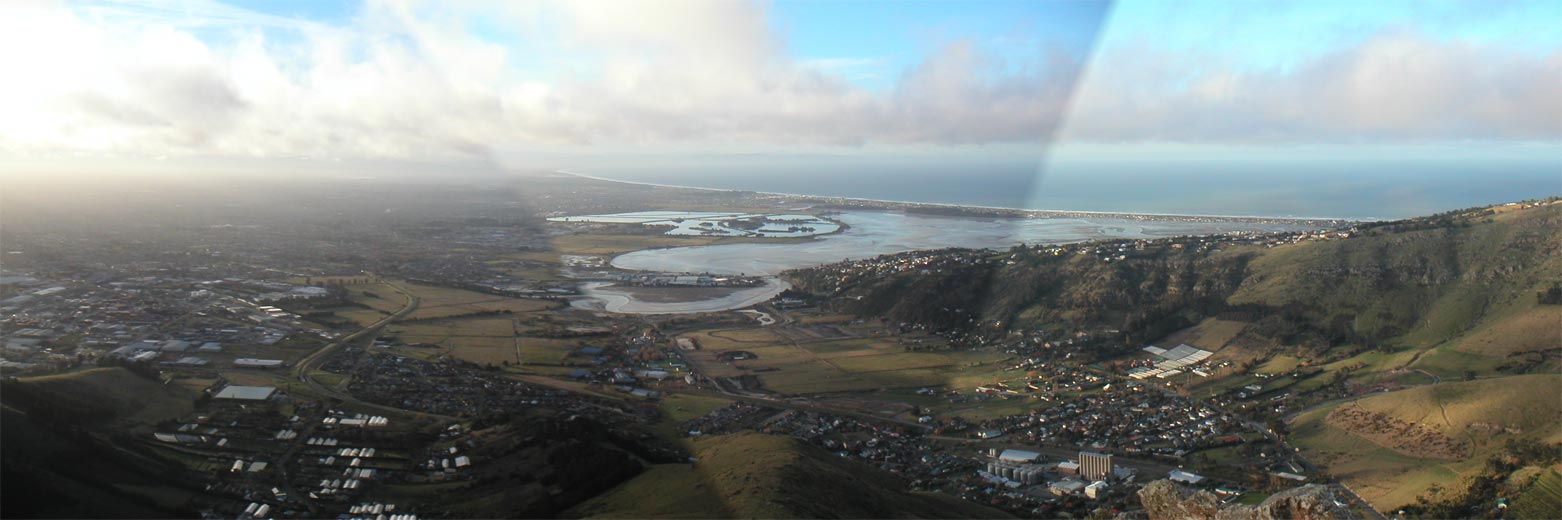 The hazy view of Christchurch from the top of Castle Rock.  We were probably on that winding road when I took the picture of this ridge earlier.