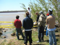 On one side is a barge coming up the Mississippi river.