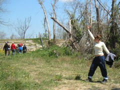 Sarah strikes a crazy pose with the levy in the distance