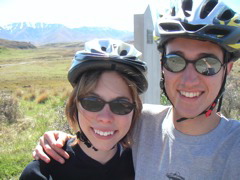 The next day it was clear and sunny and we biked past the 45-degree lattitude marker seen behind us here.  After passing this marker, the trail was mostly downhill, which was nice for a change.  Unfortunately, my ass hurt like none other.